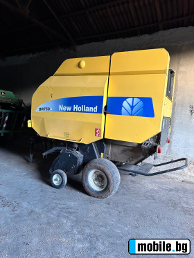      New Holland BR750A ~15 000 .