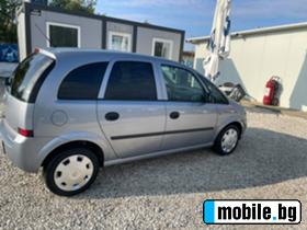 Opel Meriva 1.3cdti 75k.c UNIKAT | Mobile.bg   13