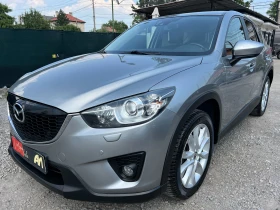 Mazda CX-5 AWD 175k.c./RVM/КОЖА/НАВИГАЦИЯ/PDC/Серв. история/ - Car24.bg Mazda CX-5 AWD 175k.c./RVM/КОЖА/НАВИГАЦИЯ/PDC/Серв. история/