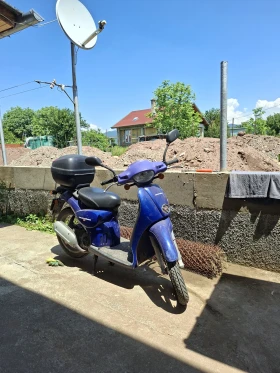 Aprilia Scarabeo Скутер