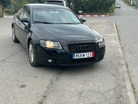 Audi A6 С6 233kc.