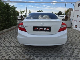 Honda Civic 1.8i-141кс= АВТОМАТ= НАВИГАЦИЯ= ПОДГРЕВ | Auto.bg — изображение 4 Honda Civic 1.8i-141кс= АВТОМАТ= НАВИГАЦИЯ= ПОДГРЕВ | Auto.bg — изображение 4