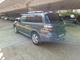 Mitsubishi Outlander 2.0 Benzin 136кс. 4×4 | Auto.bg — изображение 4 Mitsubishi Outlander 2.0 Benzin 136кс. 4×4 | Auto.bg — изображение 4
