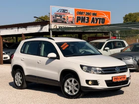 VW Tiguan 2.0TDI* 100%k* MULTI VOLAN* 6sk* PARKASISTANS* LIZ