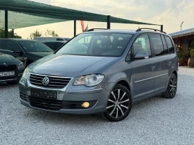 VW Touran 2.0TDi 170кс. 7места Нави Автомат - Car24.bg VW Touran 2.0TDi 170кс. 7места Нави Автомат