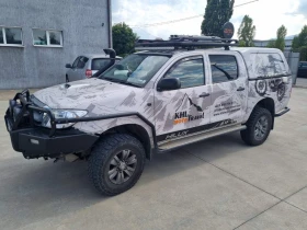 Toyota Hilux 2.5 D-4D Double Cab 4x4 - 12500 € - 58334318 2 | Car24.bg Toyota Hilux 2.5 D-4D Double Cab 4x4 - 12500 € - 58334318 2