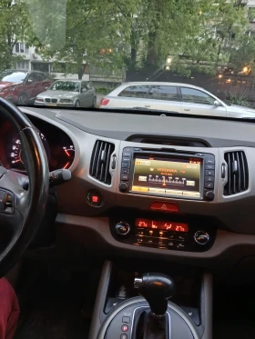 Kia Sportage 2.0.dci4?4 136к.с панорама, автомат, кожа, навигац | Auto.bg — изображение 14 Kia Sportage 2.0.dci4?4 136к.с панорама, автомат, кожа, навигац | Auto.bg — изображение 14