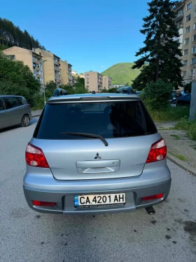 Mitsubishi Outlander 2.0i 4x4 | Auto.bg — изображение 4 Mitsubishi Outlander 2.0i 4x4 | Auto.bg — изображение 4
