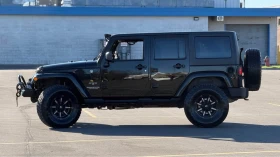Jeep Wrangler UNLIMITED Sahara, CARFAX, ЦЕНА до БГ | Auto.bg — изображение 4 Jeep Wrangler UNLIMITED Sahara, CARFAX, ЦЕНА до БГ | Auto.bg — изображение 4