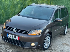 VW Touran 2.0TDI/DSG/КОЖА/HIGHLINE/NAVI/PARK ASSIST/ - Car24.bg VW Touran 2.0TDI/DSG/КОЖА/HIGHLINE/NAVI/PARK ASSIST/