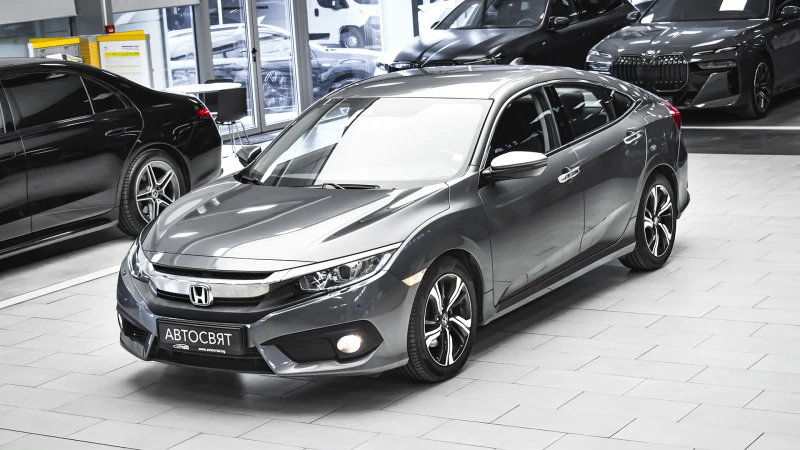 Honda Civic Elegance Sedan 1.5 VTEC Turbo Automatic - 17990 € / 35185.38 лв. - 59659617 1 | Car24.bg Honda Civic Elegance Sedan 1.5 VTEC Turbo Automatic - 17990 € / 35185.38 лв. - 59659617 1