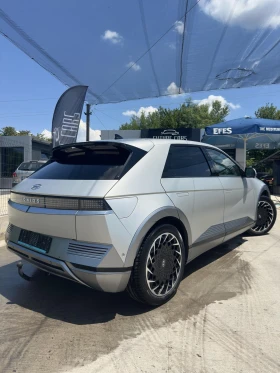 Hyundai Ioniq 5 72.6KWh/UNIQ/360/HEADUP/BOSE/ГАРАНЦИЯ/GOLD | Auto.bg — изображение 3 Hyundai Ioniq 5 72.6KWh/UNIQ/360/HEADUP/BOSE/ГАРАНЦИЯ/GOLD | Auto.bg — изображение 3