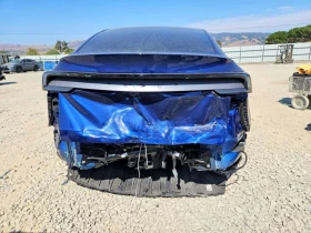 Tesla Model Y Long Range / Carfax / Застраховател | Auto.bg — изображение 6 Tesla Model Y Long Range / Carfax / Застраховател | Auto.bg — изображение 6