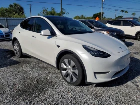 Tesla Model Y LONG* RANGE* AWD* DUAL* MOTOR*