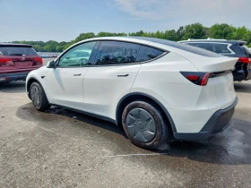 Tesla Model Y STANDARD RANGE PLUS/ТЕРМОПОМПА/RWD/CARFAX | Auto.bg — изображение 2 Tesla Model Y STANDARD RANGE PLUS/ТЕРМОПОМПА/RWD/CARFAX | Auto.bg — изображение 2