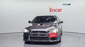 Mitsubishi Lancer EVOLUTION Автокредит Цена до България | Auto.bg — изображение 3 Mitsubishi Lancer EVOLUTION Автокредит Цена до България | Auto.bg — изображение 3