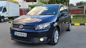 VW Touran TDI AVTOMAT/NAVIG/7mesta - Car24.bg VW Touran TDI AVTOMAT/NAVIG/7mesta