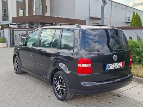 VW Touran 2.0TDI* (140кс)* 7-МЕСТА* HOB BHOC* | Auto.bg — изображение 8 VW Touran 2.0TDI* (140кс)* 7-МЕСТА* HOB BHOC* | Auto.bg — изображение 8