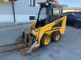 Мини челни товарачи Komatsu Sk04