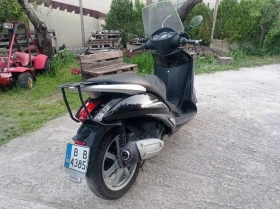 Piaggio Beverly 300 i | Auto.bg — изображение 9 Piaggio Beverly 300 i | Auto.bg — изображение 9