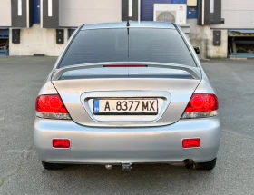 Mitsubishi Lancer 1.6 90 к.с 2008г - 2350 € / 4596.20 лв. - 89166543 6 | Car24.bg Mitsubishi Lancer 1.6 90 к.с 2008г - 2350 € / 4596.20 лв. - 89166543 6