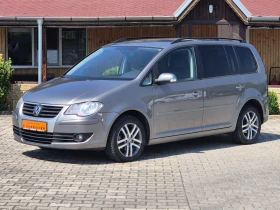 VW Touran 2.0 TDI BMM 140к.с Автомат - Car24.bg VW Touran 2.0 TDI BMM 140к.с Автомат