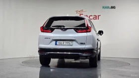 Honda Cr-v 2.0 Hybrid 4x4* HUD* КОЖА* НАВИ* ПАНО* КАМЕРА | Auto.bg — изображение 4 Honda Cr-v 2.0 Hybrid 4x4* HUD* КОЖА* НАВИ* ПАНО* КАМЕРА | Auto.bg — изображение 4