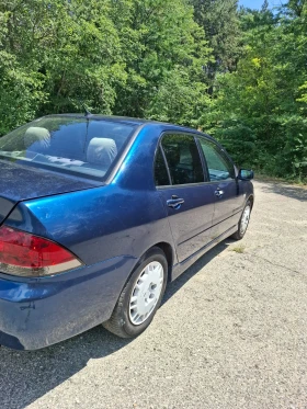 Mitsubishi Lancer - 2799 € / 5474.37 лв. - 97266533 5 | Car24.bg Mitsubishi Lancer - 2799 € / 5474.37 лв. - 97266533 5