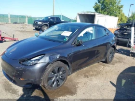 Tesla Model Y DUAL MOTOR/LONG RANGE/ТЕРМОПОМПА/CARFAX | Auto.bg — изображение 2 Tesla Model Y DUAL MOTOR/LONG RANGE/ТЕРМОПОМПА/CARFAX | Auto.bg — изображение 2
