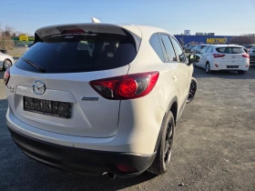 Mazda CX-5 2, 2D150ks4x4SKYACTIV-DNAVIKAMERAEU6 - 7990 € / 15627.08 лв. - 46475135 4 | Car24.bg Mazda CX-5 2, 2D150ks4x4SKYACTIV-DNAVIKAMERAEU6 - 7990 € / 15627.08 лв. - 46475135 4