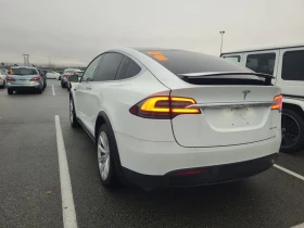 Tesla Model X * LONG RANGE PLUS * CARFAX * БЕЗ ПЪРВОНАЧАЛНА ВНОС - 70950 лв. / 36276.16 € - 33989505 4 | Car24.bg Tesla Model X * LONG RANGE PLUS * CARFAX * БЕЗ ПЪРВОНАЧАЛНА ВНОС - 70950 лв. / 36276.16 € - 33989505 4