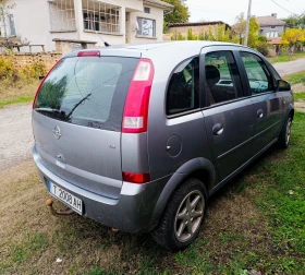 Opel Meriva 1.6 101 | Auto.bg — изображение 4 Opel Meriva 1.6 101 | Auto.bg — изображение 4