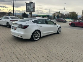 Tesla Model 3 Long range /dual motor / 82 kWh / 467 kc. - 37999 лв. / 19428.58 € - 58995780 4 | Car24.bg Tesla Model 3 Long range /dual motor / 82 kWh / 467 kc. - 37999 лв. / 19428.58 € - 58995780 4