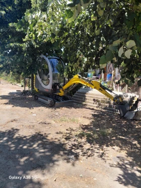 Багер Neuson 1503