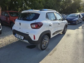 Dacia Spring Comfort Plus 45CCS Гаранция Лизинг | Auto.bg — изображение 5 Dacia Spring Comfort Plus 45CCS Гаранция Лизинг | Auto.bg — изображение 5
