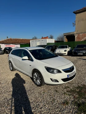 Opel Astra 2.0CDTi / Кожа / Подгрев / Navi - Car24.bg Opel Astra 2.0CDTi / Кожа / Подгрев / Navi
