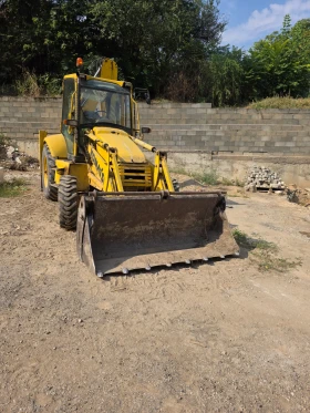Багер Komatsu Wb93-2