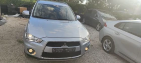Mitsubishi Outlander 2.2DIESEL | Auto.bg — изображение 10 Mitsubishi Outlander 2.2DIESEL | Auto.bg — изображение 10