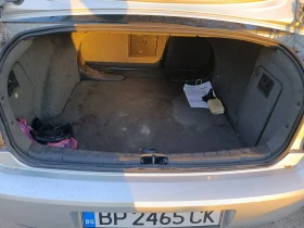 Opel Vectra 2.2 DTI 125 | Auto.bg — изображение 16 Opel Vectra 2.2 DTI 125 | Auto.bg — изображение 16