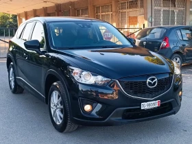 Mazda CX-5 2.0i-160кс-ШВЕЙЦАРИЯ-АВТОМАТ-4Х4-KEYLESS-NAVI - 11500 € - 11449029 2 | Car24.bg Mazda CX-5 2.0i-160кс-ШВЕЙЦАРИЯ-АВТОМАТ-4Х4-KEYLESS-NAVI - 11500 € - 11449029 2