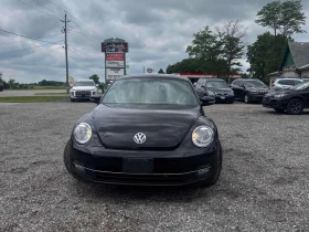 VW Beetle * 2dr Cpe 2.0L TDI DSG Highline * CARFAX * | Auto.bg — изображение 6 VW Beetle * 2dr Cpe 2.0L TDI DSG Highline * CARFAX * | Auto.bg — изображение 6