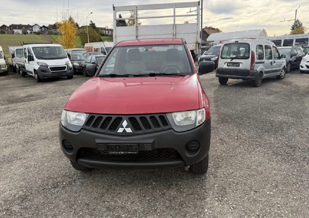 Mitsubishi L200 2.5DiD* 4Х4* САМОСВАЛ* ШВЕЙЦАРИЯ*  - изображение 4 | Auto.bg Mitsubishi L200 2.5DiD* 4Х4* САМОСВАЛ* ШВЕЙЦАРИЯ*  - изображение 4