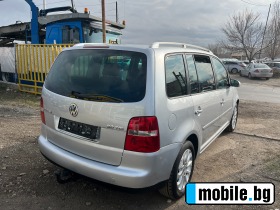 VW Touran 2.0 TDI 7  | Mobile.bg   4