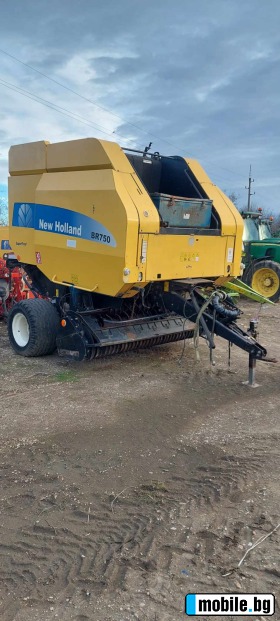     New Holland BR 750 ~17 500 .