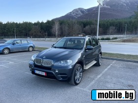     BMW X5 3.5i  ~25 700 .
