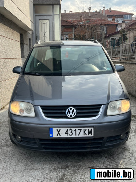    VW Touran ~8 200 .