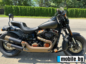     Harley-Davidson Custom ~56 000 .