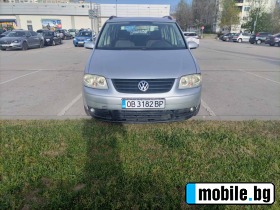     VW Touran  ~5 000 .
