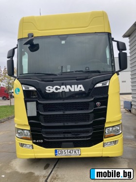     Scania R R410 ~15 000 .