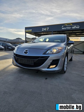     Mazda 3 2.0i ~11 999 .
